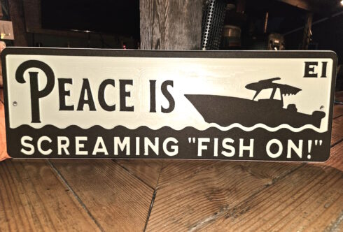 Fish On Peace Sign -visual description