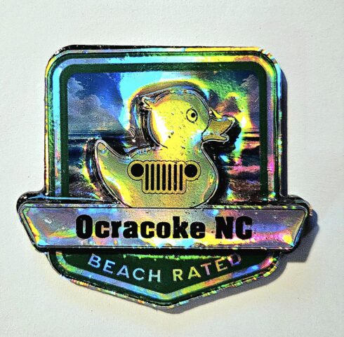 Ocracoke Beach Rated Jeep/Duck Medallion -visual description
