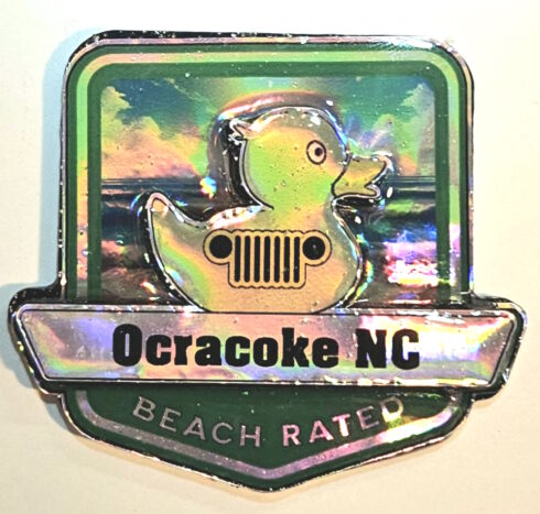 Ocracoke Beach Rated Jeep Medallion/Badge -visual description