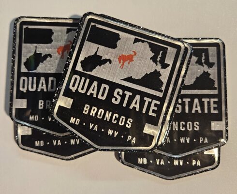 Quad State Broncos Medallion -visual description