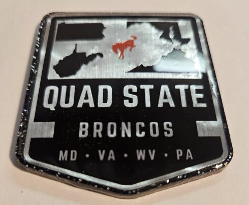 Quad State Broncos Medallion -visual description