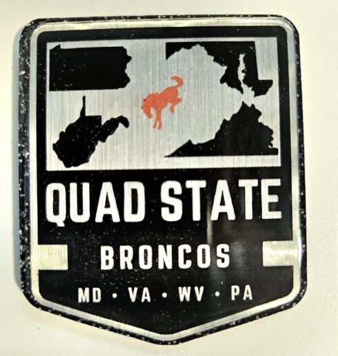 Quad State Broncos Medallion -visual description