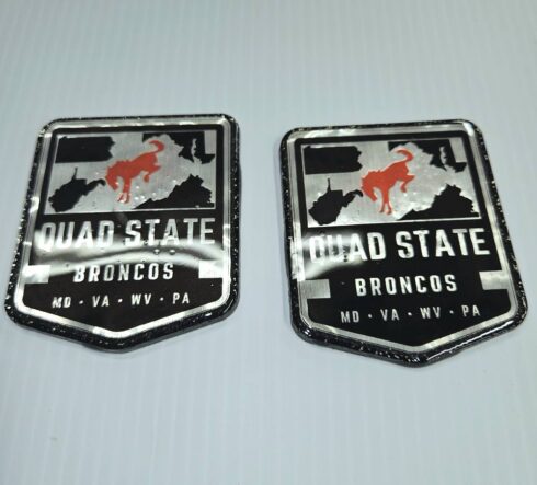 Quad State Broncos Medallion -visual description