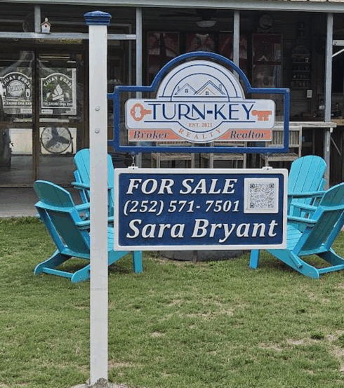 Carved Real Estate Sign -visual description