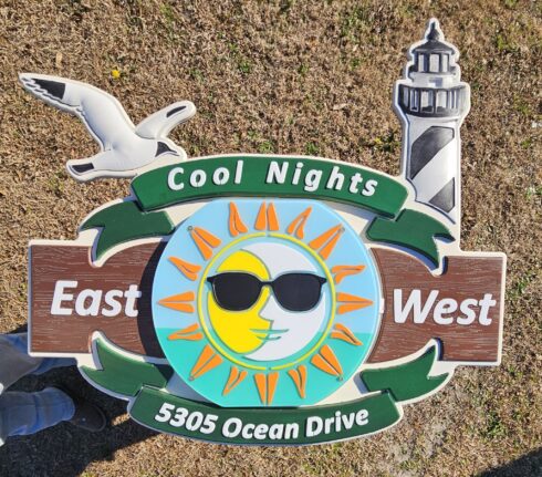 carved and backlit sign