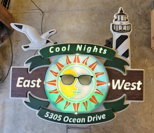 carved and backlit sign