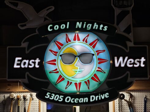 carved and backlit sign