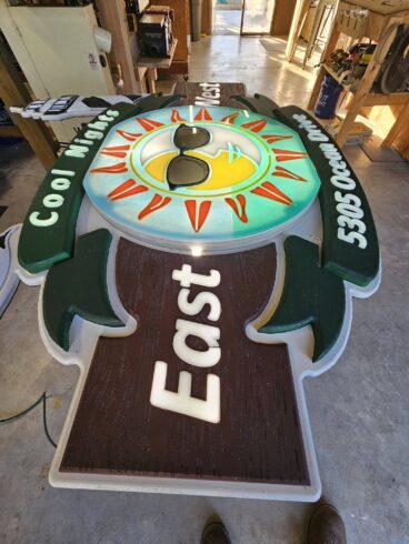 carved and backlit sign