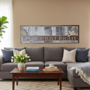 carved image sign -visual description